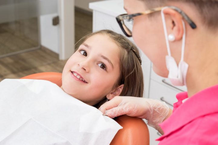 little girl at dentist